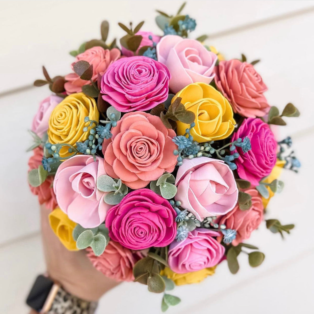 pink and yellow bouquet wood flowers